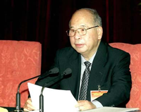 尉健行